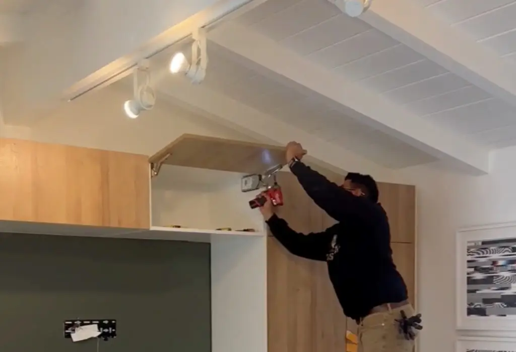 Storage cabinet installation with Beachwood doors