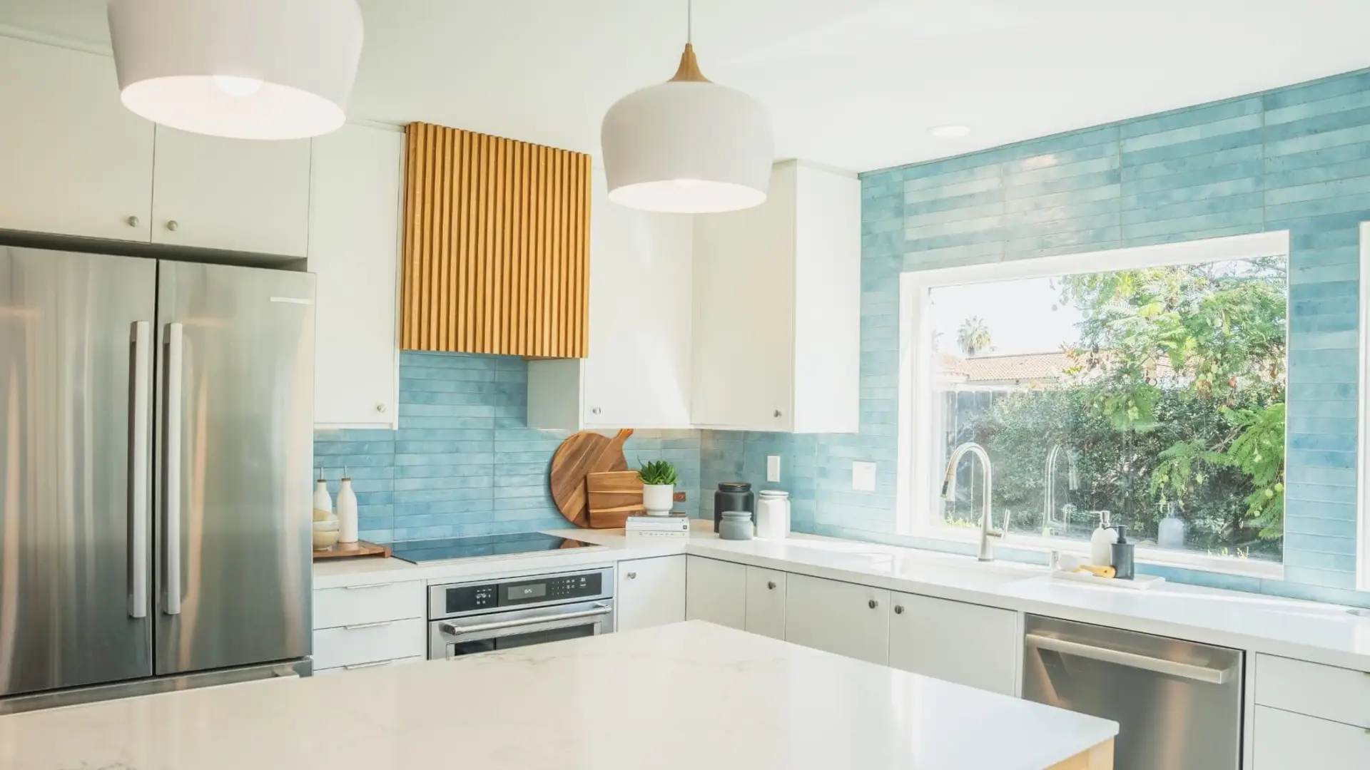 White Slab door fronts handcrafted by Modern Twig on Ikea Sektion kitchen cabinets.